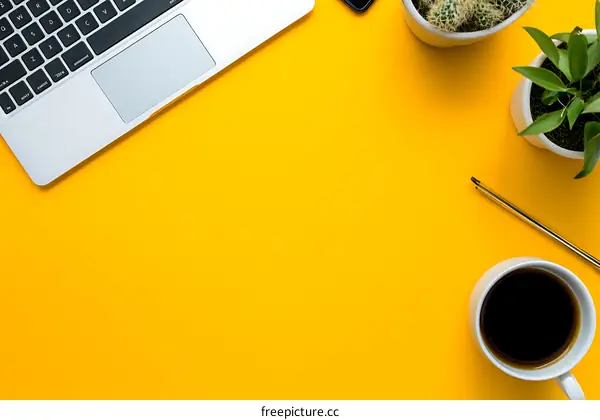 Yellow Background Minimalist Flatlay with Laptop, Plants, and Coffee