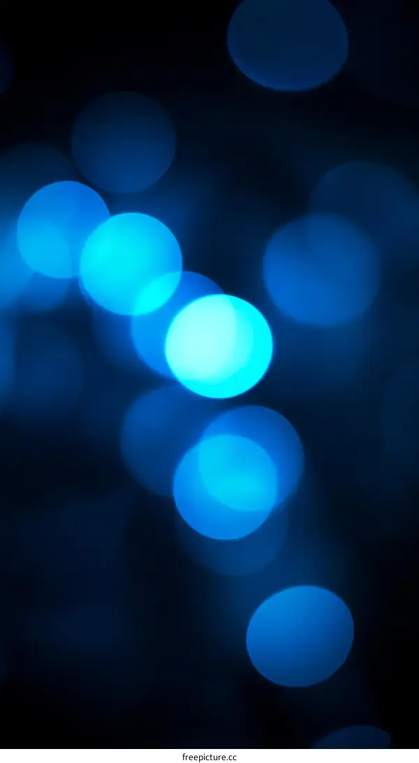 Abstract Bokeh Lights Blue Color Background