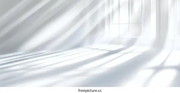 Empty Room Filled with Sunlight and Shadows