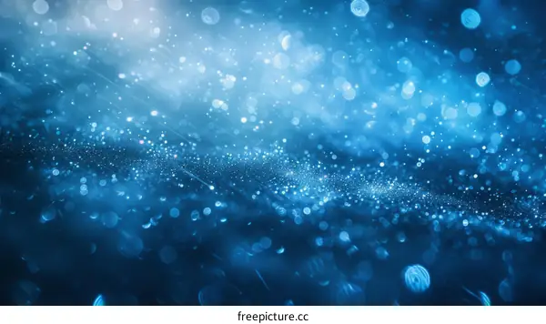 Blue abstract glowing background with glitter and stars