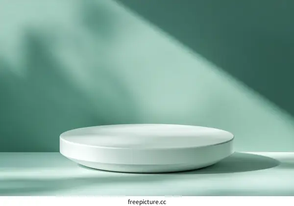 Minimalist White Product Display Stand on Light Teal Background