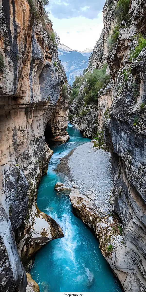 Blue River Flowing Through Mountain Gorge