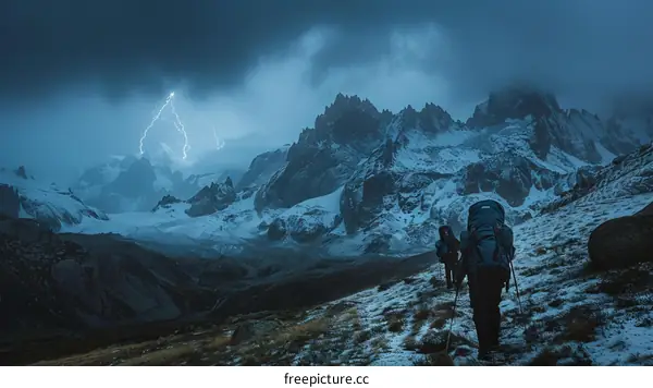Two hikers on a mountain trail during a lightning storm