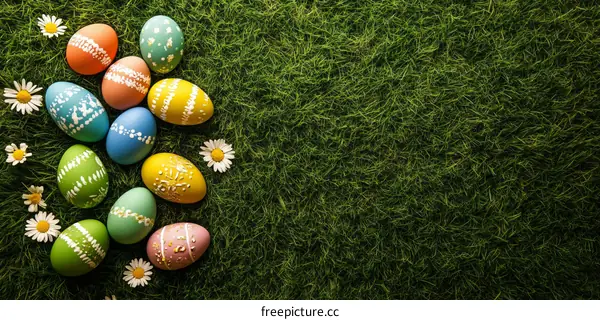 Colorful Easter Eggs on Grass Background