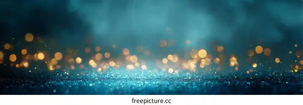 Abstract Background with Teal Glitter and Golden Bokeh