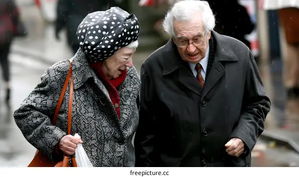 Elderly Couple Walking in the Rain