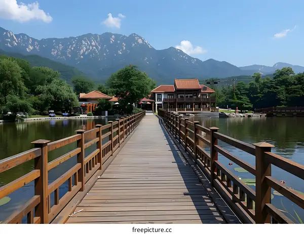 Wooden Bridge Leading to Chinese Style Building with Mountain Background