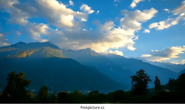 Majestic Mountain Range Under a Dramatic Sky