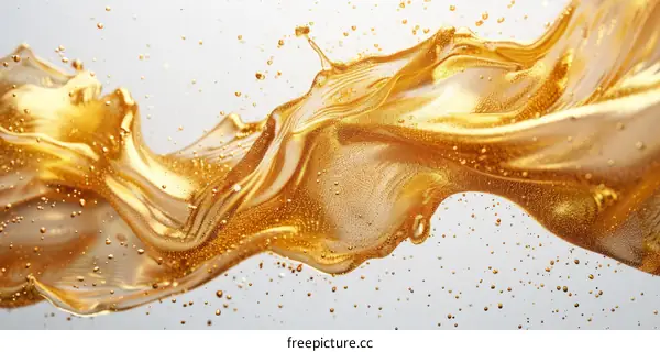 Golden Liquid Splash with Droplets