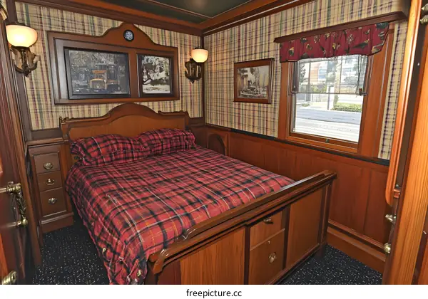 Traditional Wooden Bedroom Interior With Plaid Bedding