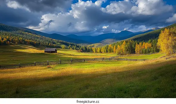 Autumnal Mountain Meadow with Rustic Cabin