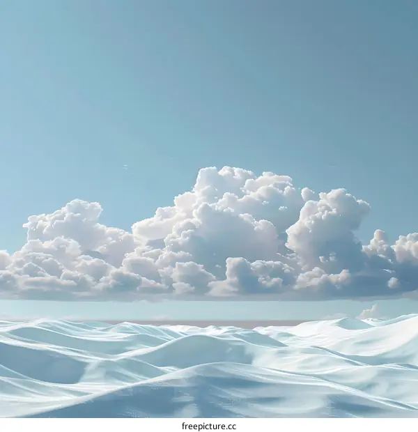 Snow-capped mountains under blue sky and white clouds