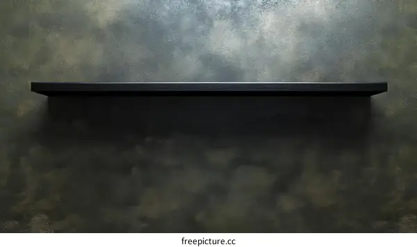 Empty Black Shelf Against Textured Wall