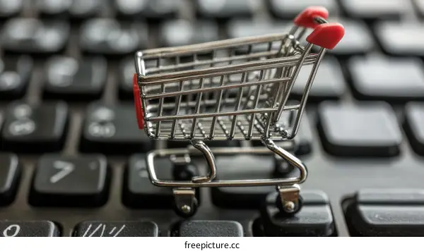Miniature Shopping Cart on a Computer Keyboard