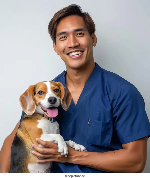 Portrait of a happy veterinarian with a beagle