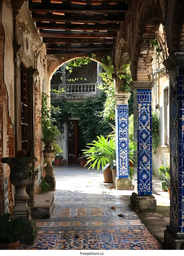 Blue Tile Pillars and Archway in Old Building Courtyard