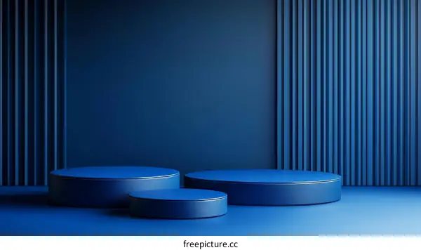 Three Dark Blue Cylindrical Display Platforms