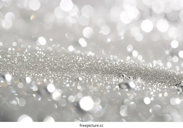 Silver glitter sparkle background with shiny lights