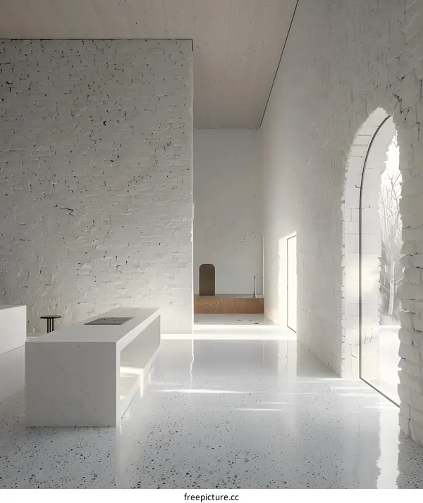 Minimalist White Interior Design with Terrazzo Floor and Arched Window