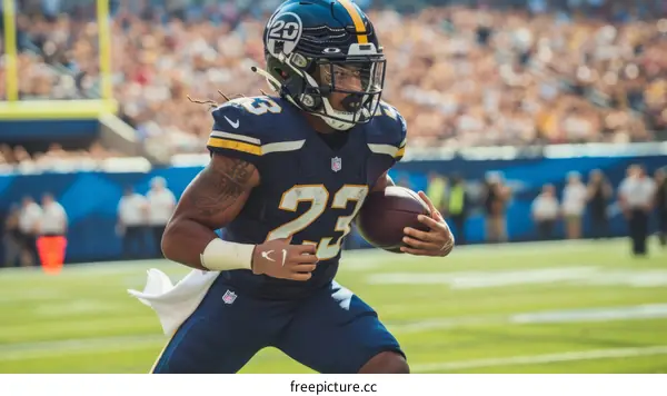 Los Angeles Chargers running back Justin Jackson stiff arms a defender during the 2022 NFL season.