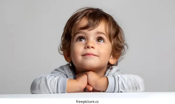Portrait of a Curious Baby Looking Up