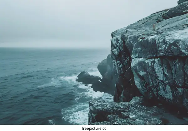 Ocean Cliffside View With Waves Crashing