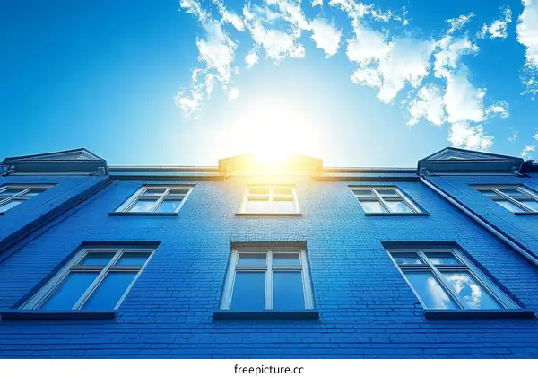 Vibrant Blue Building Against a Clear Sky