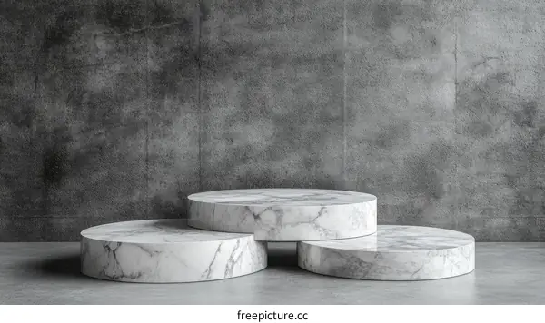 Marble Product Display Platform Against a Grey Concrete Wall