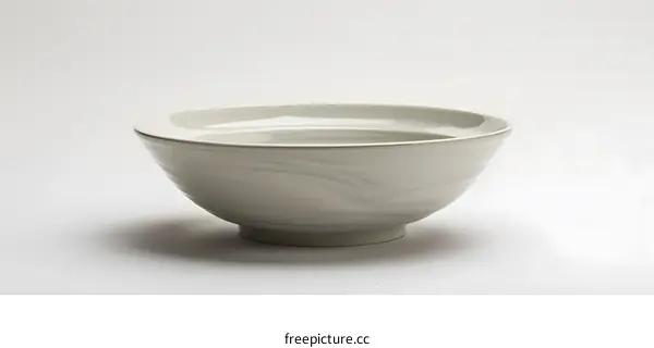 White ceramic bowl on white background