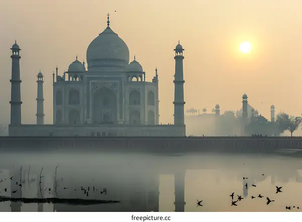 Sunrise Over Taj Mahal With Fog