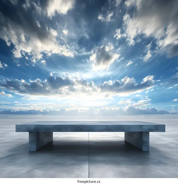 Empty Concrete Platform Against Blue Sky with Clouds