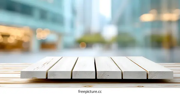 White Wooden Tabletop with Blurry City Background