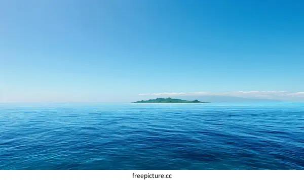 Small tropical island in the middle of vast ocean