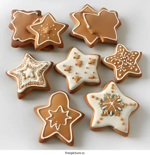 Various shapes of gingerbread cookies decorated with white and brown icing