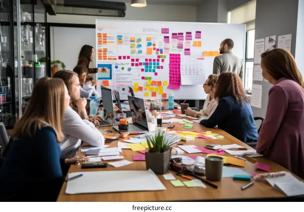A group of people in a meeting room brainstorming ideas