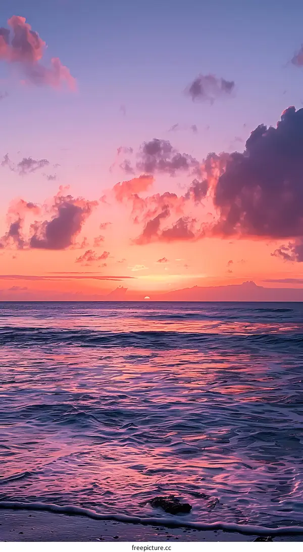 Pink and Purple Sunset Over the Ocean