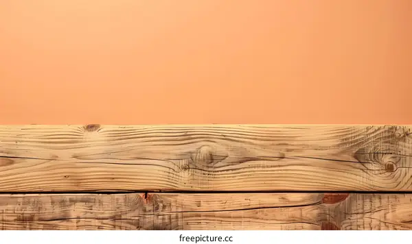 Two Wooden Planks on an Orange Background