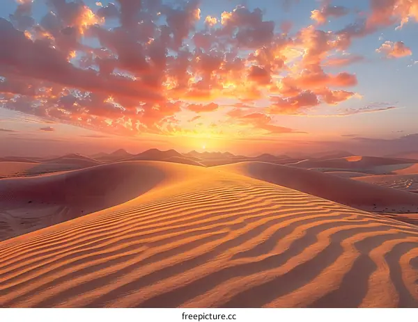 Desert Sunset Over Rippling Sand Dunes