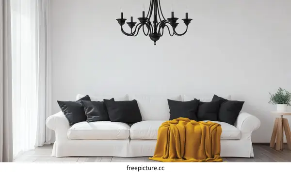 Modern Interior Design with Black Chandelier and Mustard Yellow Throw