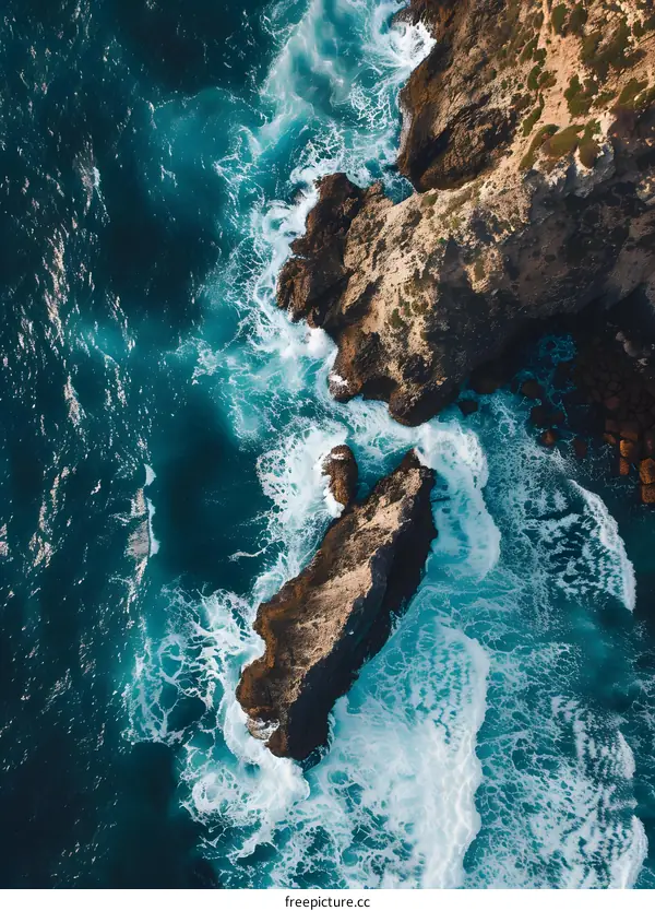 Aerial View of the Ocean with Cliffs and Waves