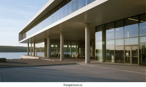 Modern waterfront building with large glass windows