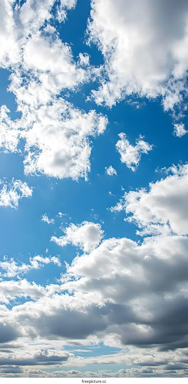 Blue Sky With White Clouds On A Sunny Day
