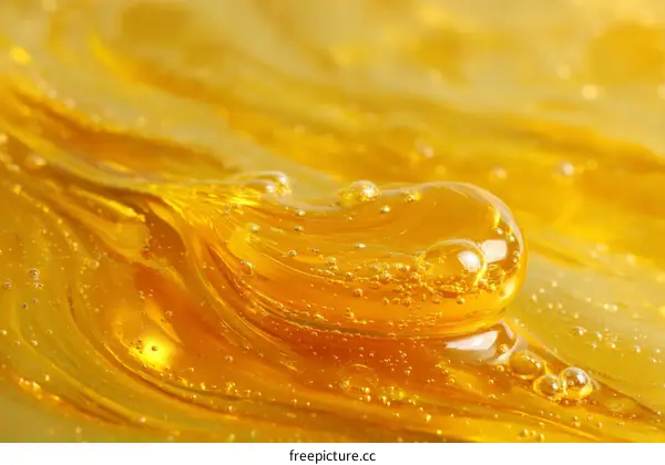 Close-up View of Golden Liquid with Bubbles