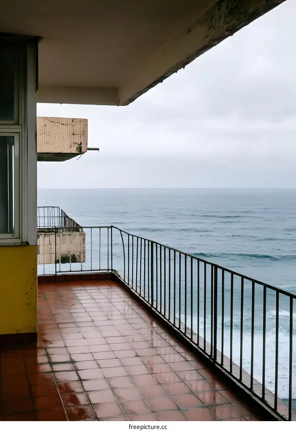 Balcony View of the Ocean with a Metal Railing