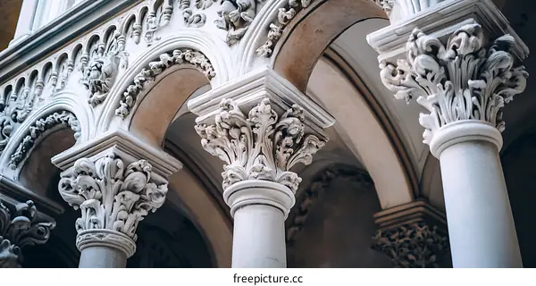 Ornate White Column with Archway Detail