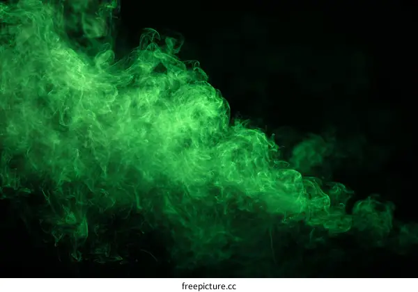 Abstract Green Smoke Patterns on Black Background