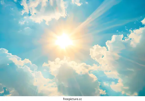 Bright Sun Shining Through Clouds in the Sky