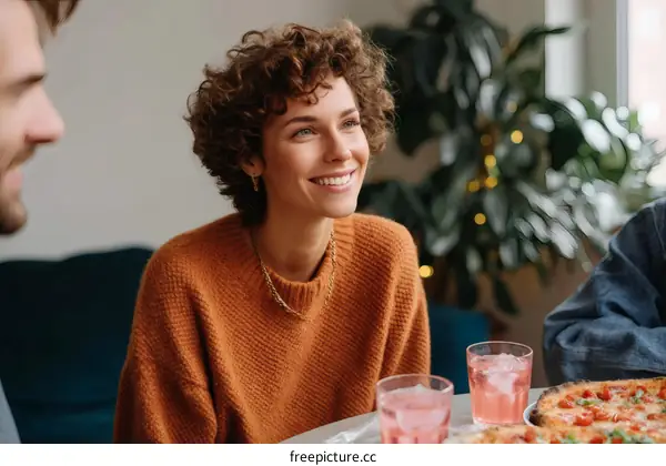 Friends Enjoying Pizza and Conversation