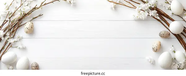 Easter Eggs with Blossoms on White Wood