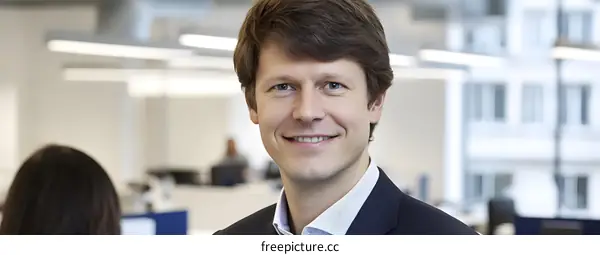 Smiling Man in Business Attire Portrait in an Office Setting